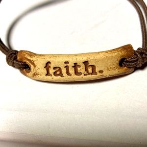 Mudlove bracelet on brown elastic twine with Faith on the front. #bme2040